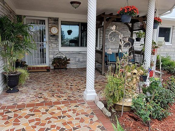 Huge front porch, enough room for a x-large front porch swing and plants.