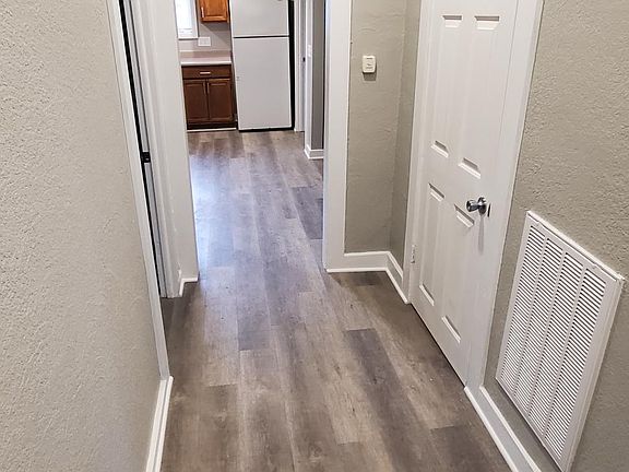 Entry way from front of home with large coat closet on right