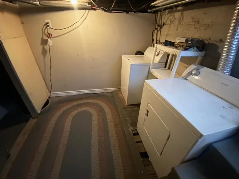 Separate shared laundry space (washer and dryer not provided or maintained by owner).