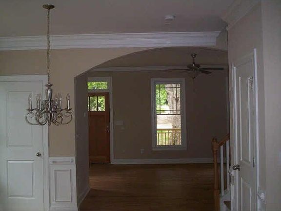 View to living room/entrance from dining room.