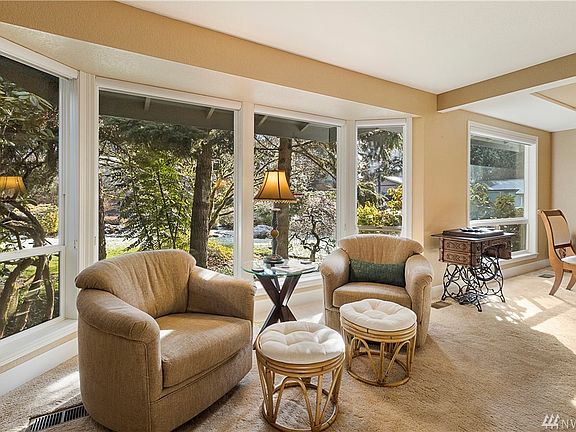 Large windows in living and dining room bring the outdoors in.  Updated Double pane vinyl windows throughout home.  