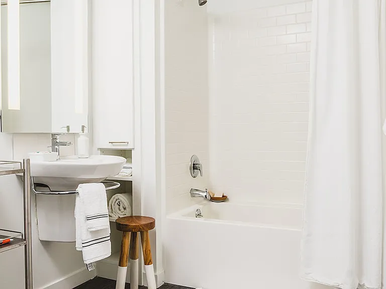 Elegant finishes with Moen fixtures and Ceasarstone quartz countertops