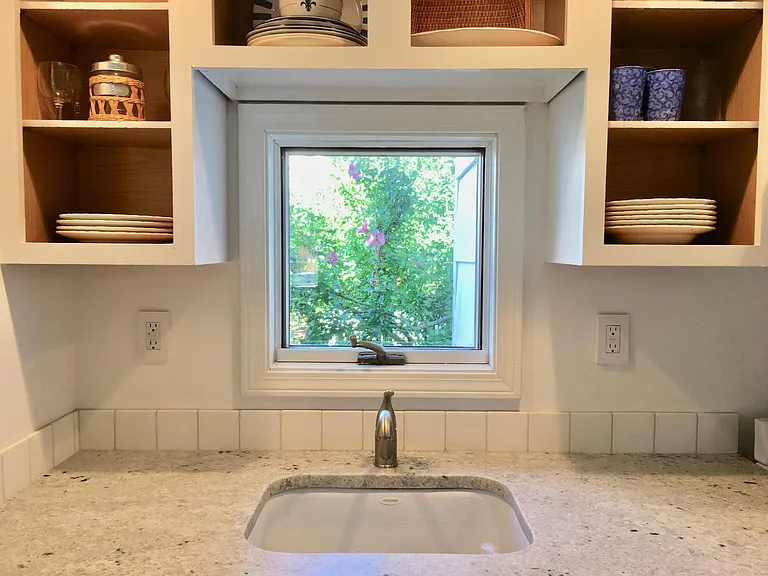 New kicthen with granite counters and new cabs, dishwasher, fridge