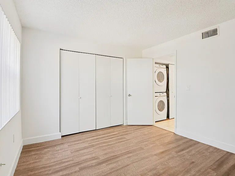 Spacious Apartment with Laminate Wood Flooring Throughout