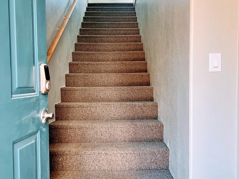 Up the flight of stairs and into your new home!