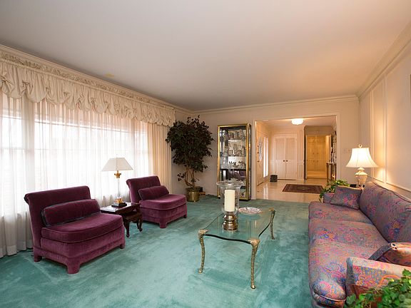 Formal living area with beautiful moldings.