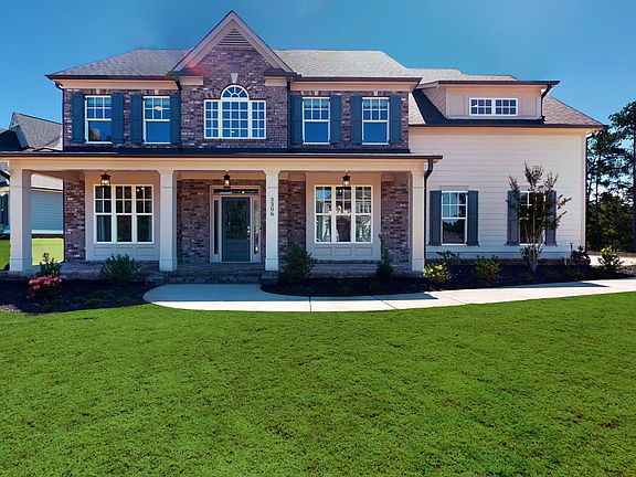 Garrett - New Construction. Representation of home. Actual home will have front-entry garage.