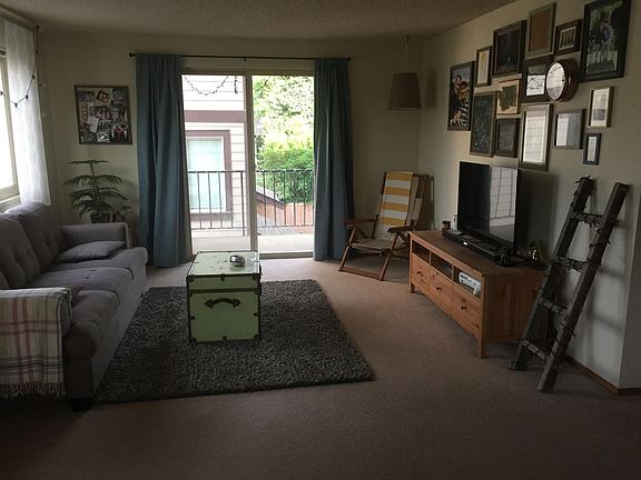 A furnished shot of living room to porch.