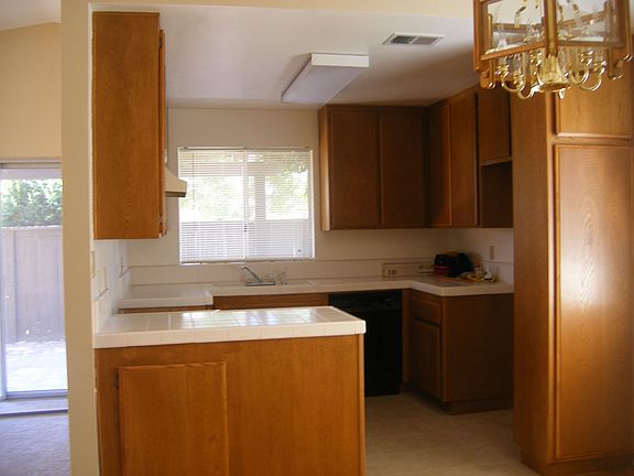 refinished cabinets/new floor tile