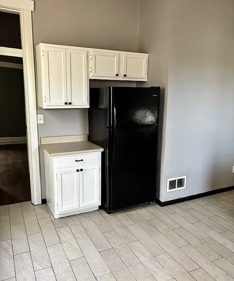 Appliances include stove, refrigerator and dishwasher