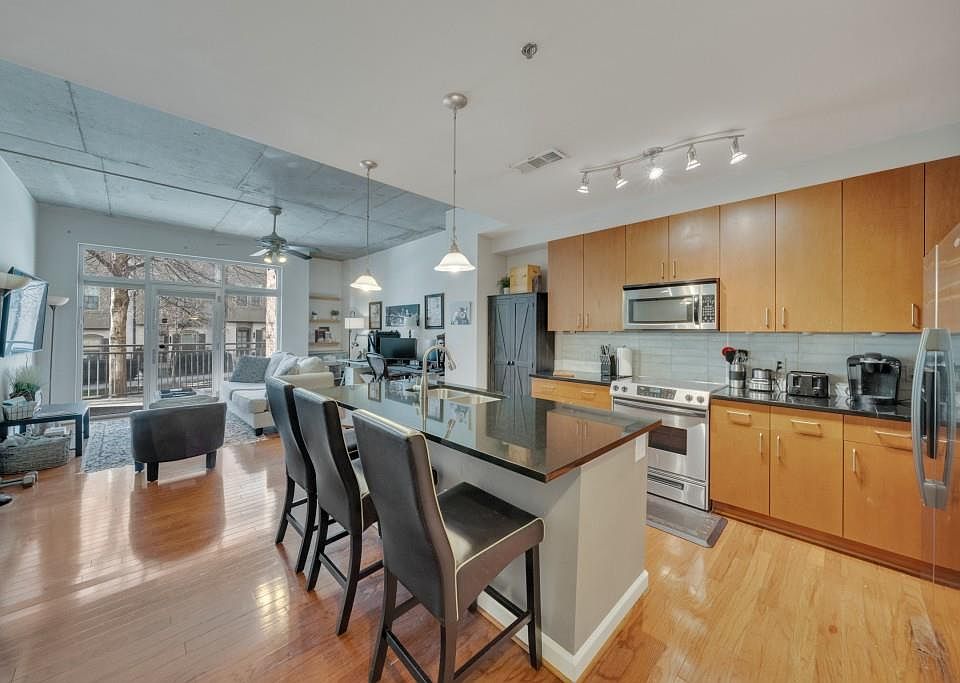 1st image of 711 Cosmopolitan Dr NE Unit Tl1