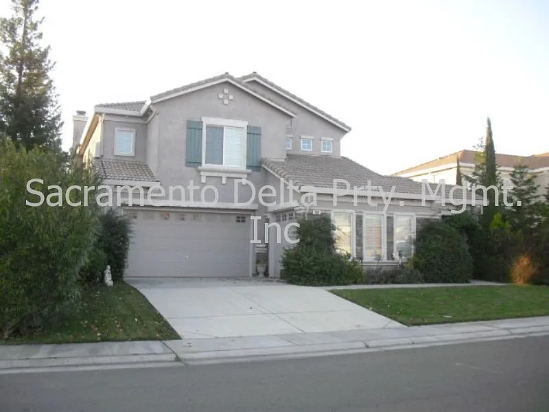 7864 Tigerwoods Dr photo 1