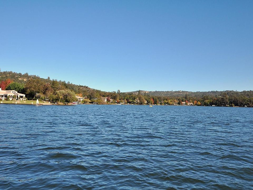 The wonderful home is located at the opening of a cove in a No Wake Zone.