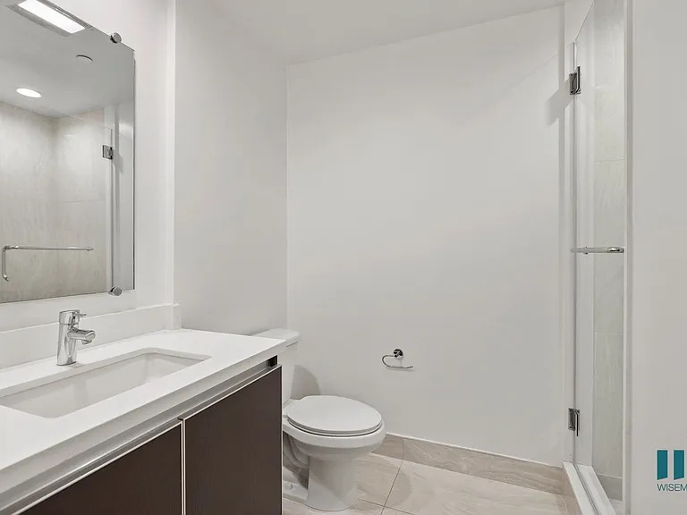 Bathroom with Stand-Up Shower and Glass Door