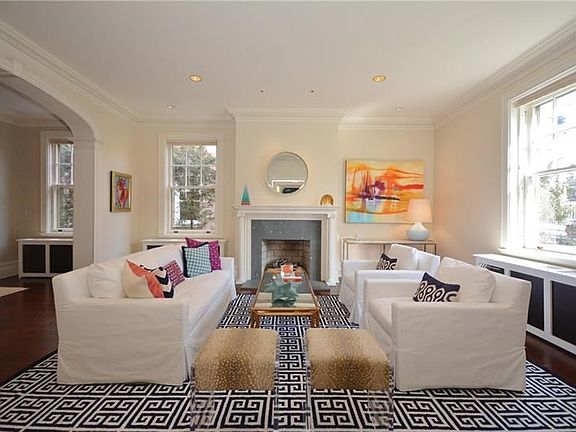Sun-soaked living room is bright and inviting.