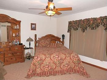 Master bedroom with plenty of space ceiling fans in all bedrooms