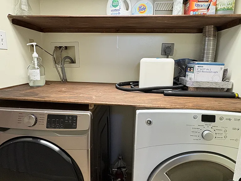 Washer and Dryer with Storage in Basement