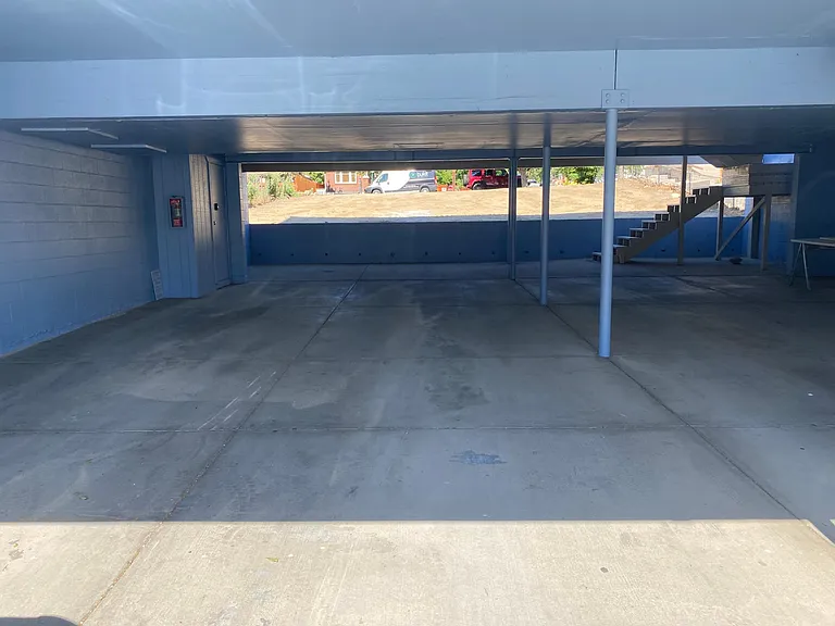 Unit Three Covered parking area and Storage area