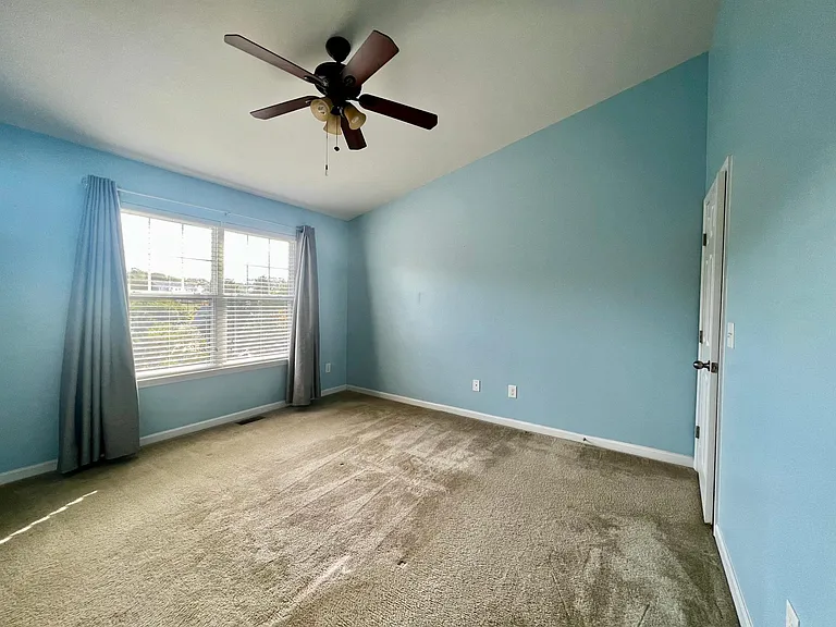 Upstairs you'll find a large master bedroom