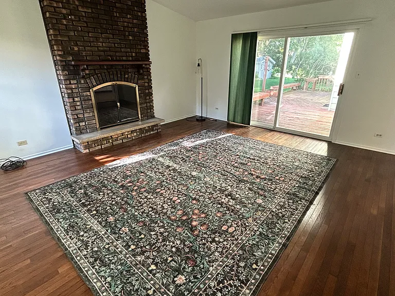 family room 16x17 off of kitchen and looking toward deck.