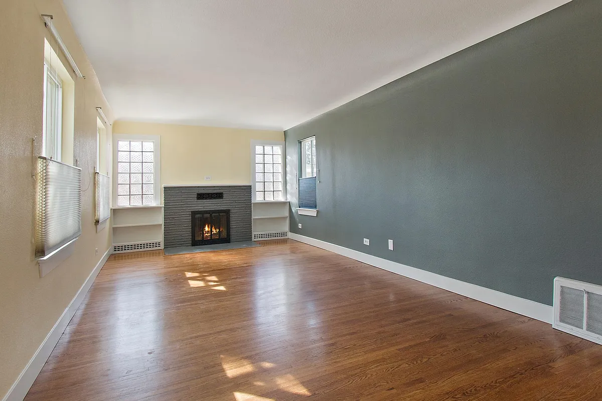 Living Room with Fireplace and Hardwoods - 2595 S Lafayette St