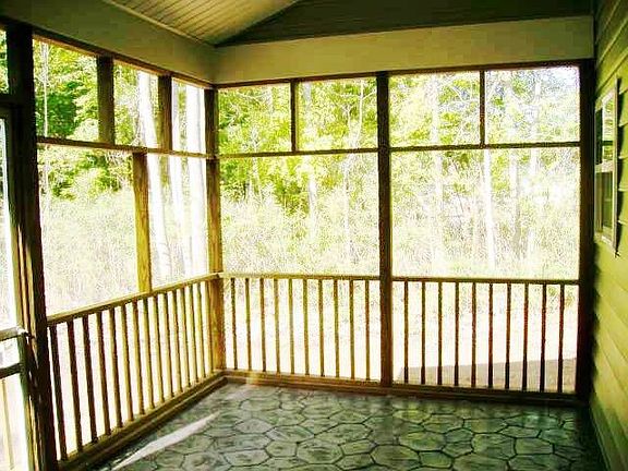 Screened in stamped porch