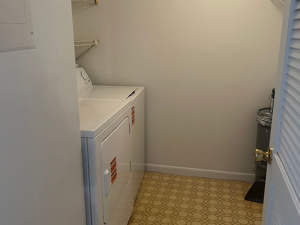 Laundry room with brand new full size Washer and Dryer