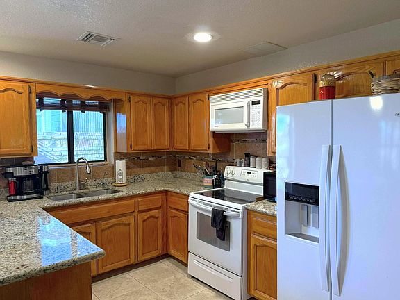 5th image of 13854 E 48th Dr
