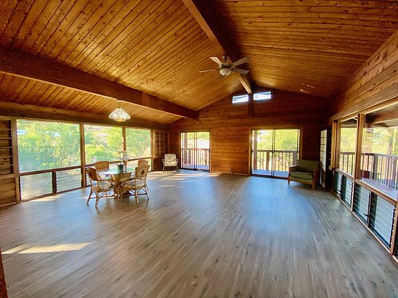 Great room surrounded with windows