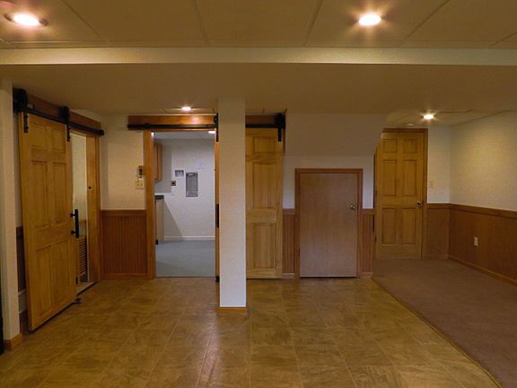 Small doorway offers under stair storage closet. Main closet to the right of that storage door.