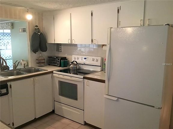 Plenty of Kitchen Cabinets and separately, 2 extra cabinets used for the pantry.