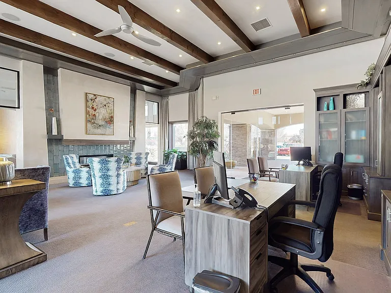 Step into this stylish business lounge designed for productivity and relaxation.