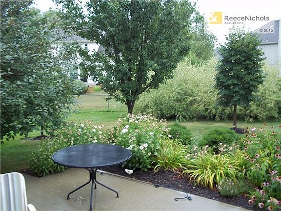 Wonderfully Landscaped With Flowering Trees And Bushes