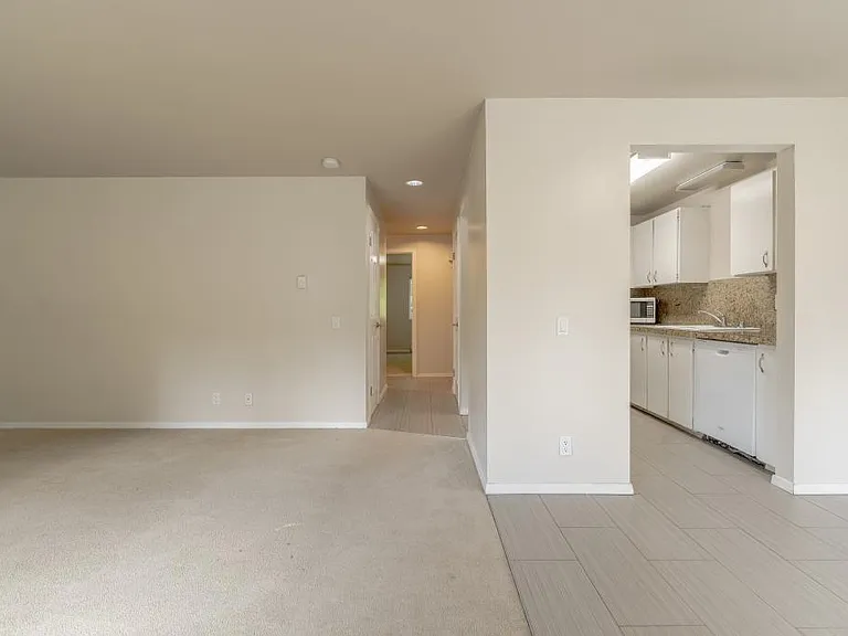 View of living room/dining & kitchen from balcony