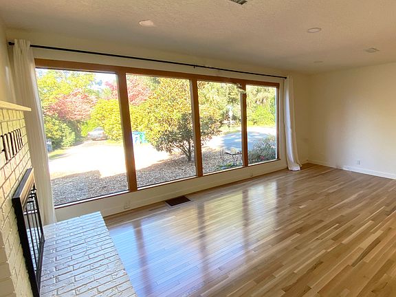 Large wall of windows in the living room.