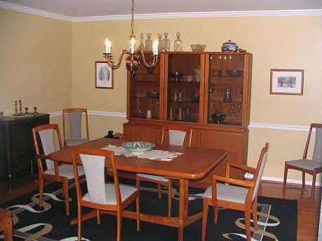 Formal DR w/bay window, recessed lights, crwon molding & chair railing
