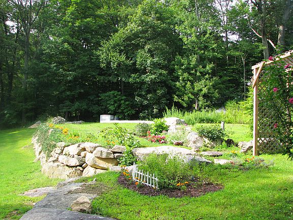 Steps to large level lawn.