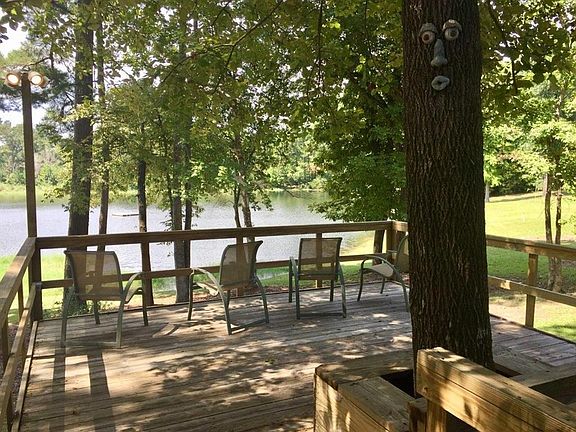Back deck overlooking private Lake.