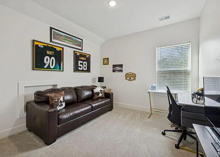 Office with leather pull-out couch on 3rd floor