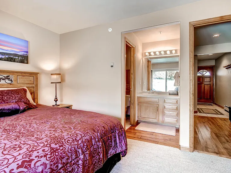 First floor bedroom with private vanity and bathroom