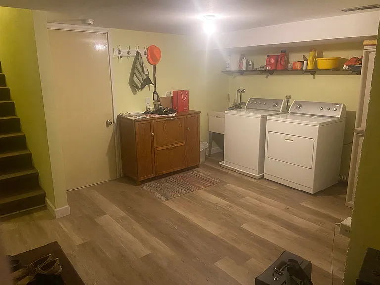 Washer & dryer in basement, door leads into the 2 car garage