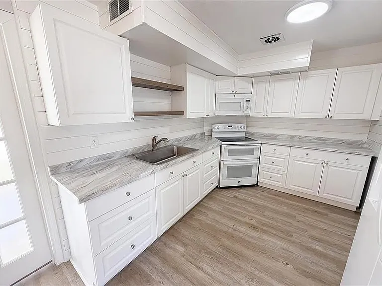 7338 Tangelo Ave — Photo 9