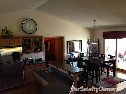 Kitchen and Dining area
						:
						Great Entertaining space with open floor plan and two tiered island