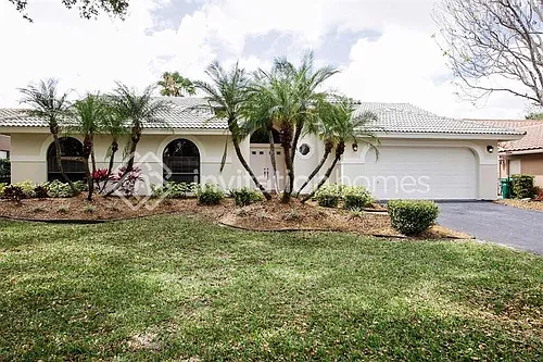 5166 NW 99th Way Photo 1