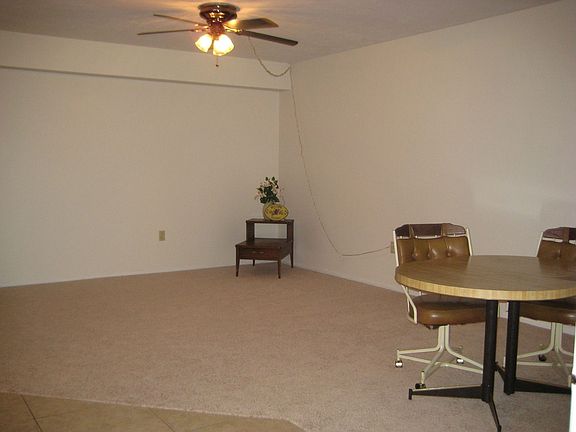 H-U-G-E living room measures 20x15. Picture window with great view of the pool