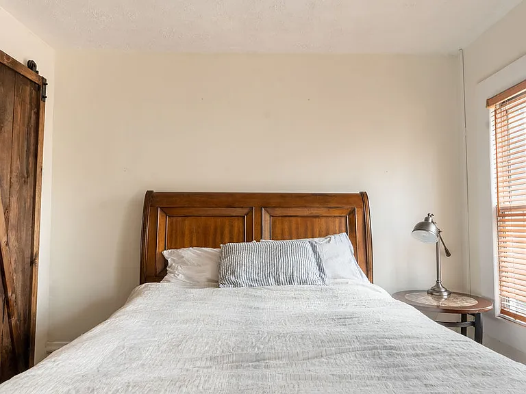 Master bedroom
NOTE: This bed frame stays with the house. Mattress removal is negotiable.

Bed frame has bottom drawers for extra storage space :)