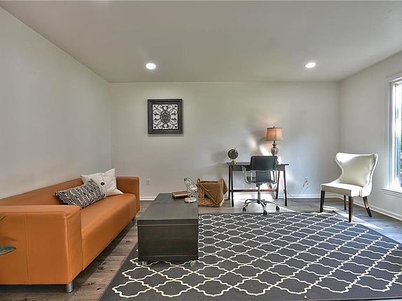 Formal Living Room or Front Office with loads of natural light.