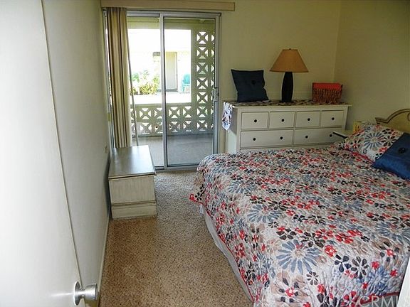 BEDROOM LOCABLE SLIDING GLASS DOOR TO PATIO