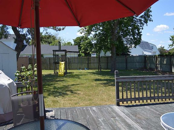 Huge back yard big enough for a pool and still have  room for entertaining