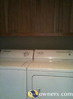 upstairs laundry with storage